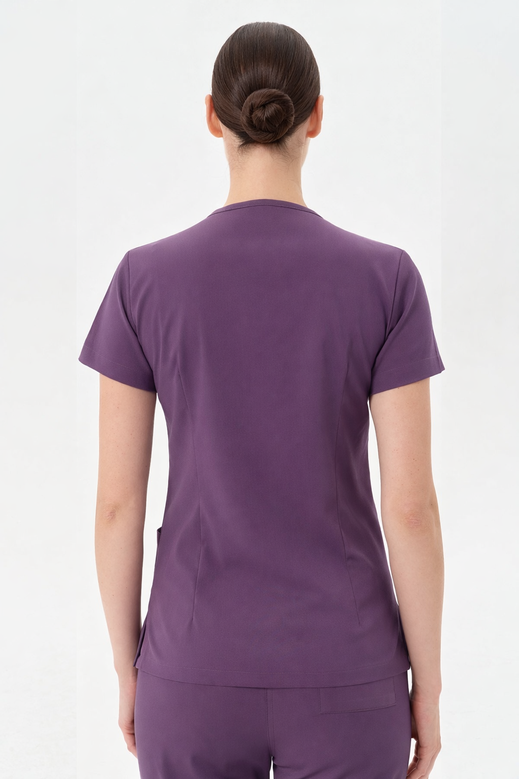 Eflatun kadın medikal pantolon, ergonomik bel tasarımı ve cep detayları.